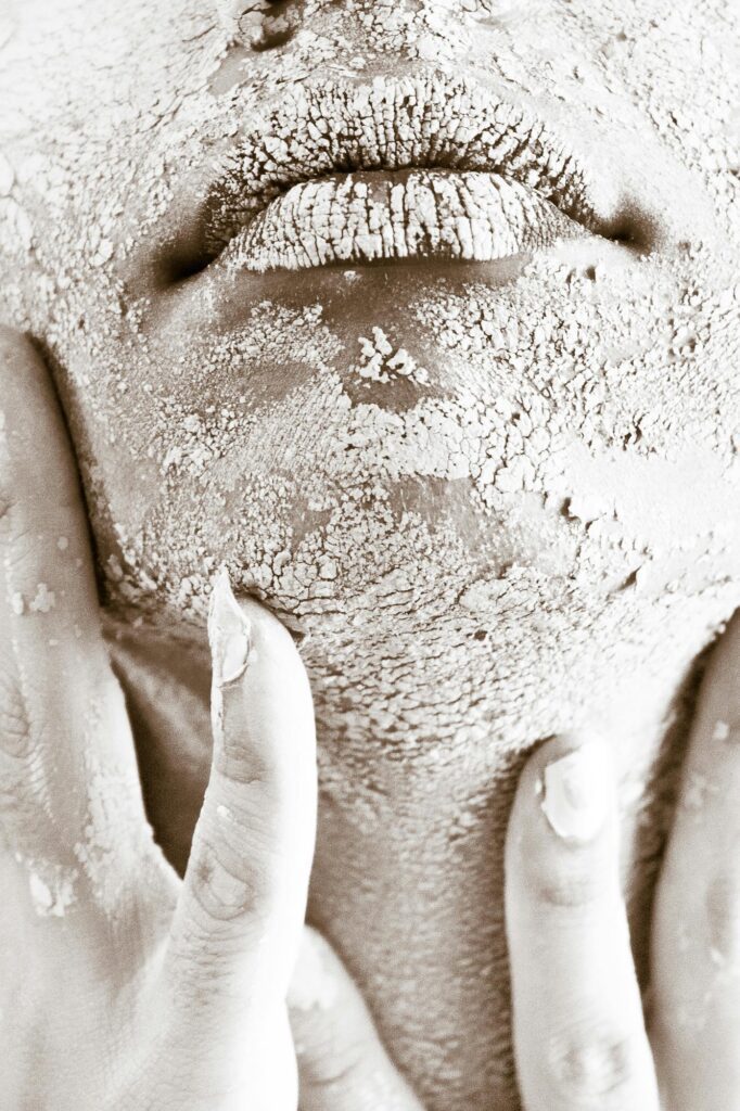 pexels photo 682501 682501 Artistic close-up of a woman's textured skin emphasizing raw beauty and skincare challenges.